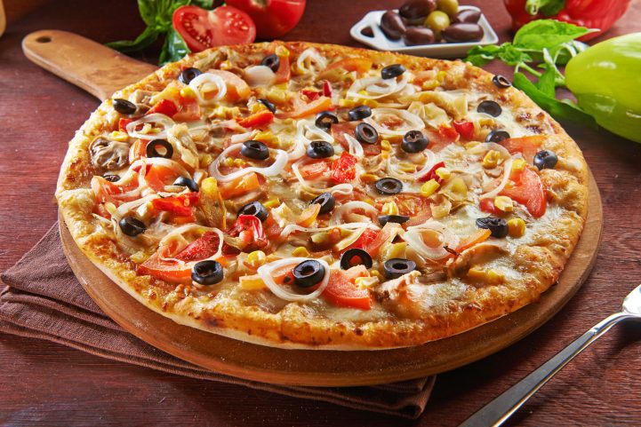 iStock/ تدفع طريقة تحضير البيتزا السهلة معظم الناس لأن يعتبروها من الأكلات الأساسية