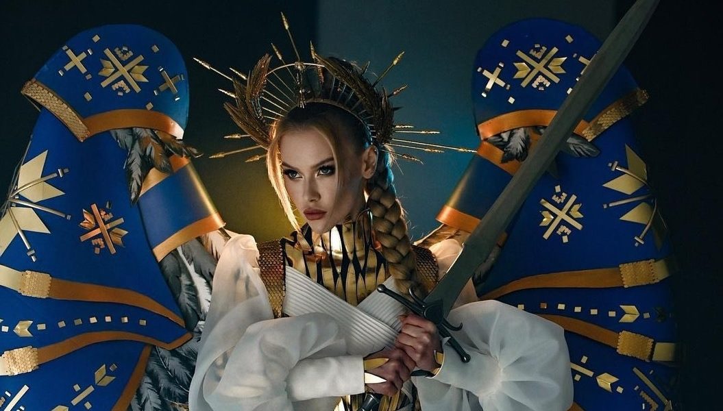 A Ukrainian woman participates in the Miss Universe contest in a war symbolizing outfit.