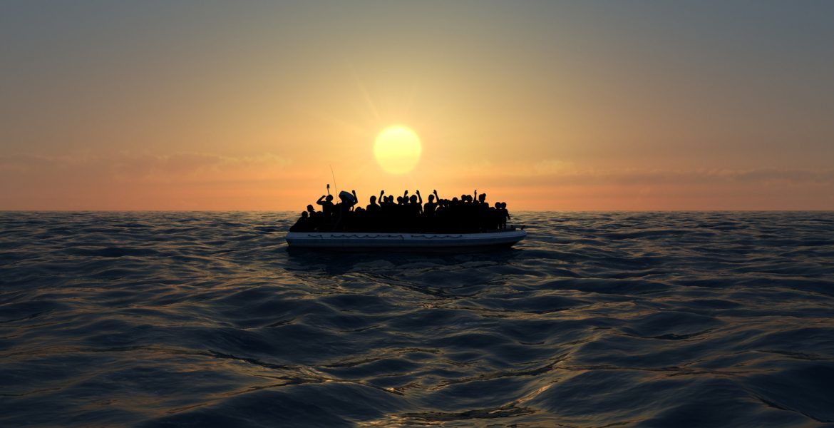 قارب مهاجرين وسط البحر - صورة تعبيرية / Istock